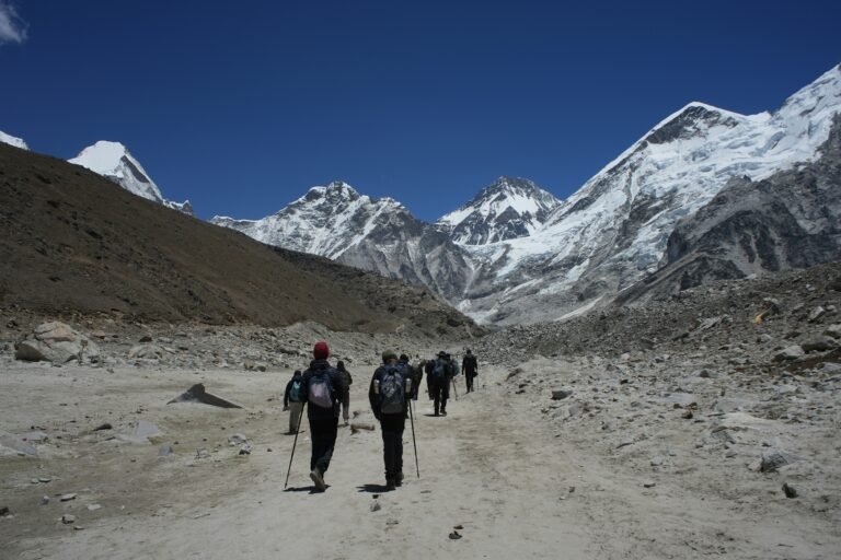 Trekkers on the high altitude trail to Everest Base Camp — altitude sickness on the Everest Base Camp trek affects around 75% of trekkers