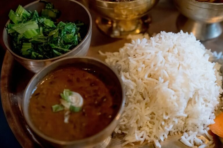 A plate of dal bhat — rice, lentil soup, and vegetable curry — the staple meal on the Everest Base Camp trek