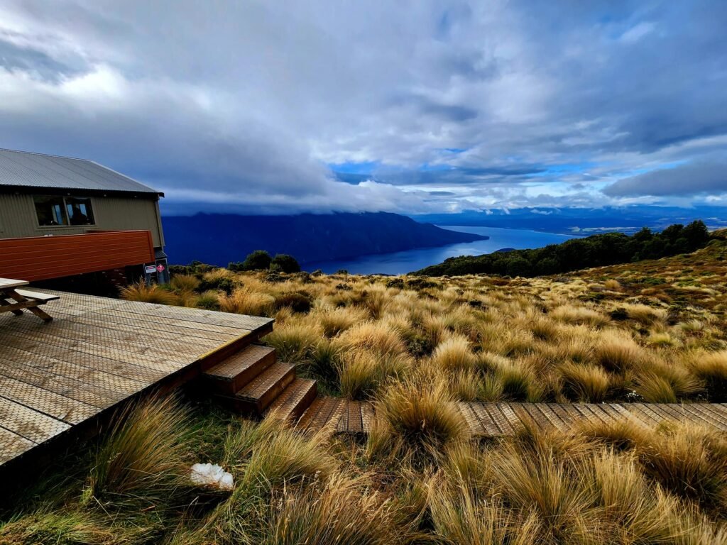 Luxmore Hut deck with panoramic view over Lake Te Anau on the Kepler Track Great Walk