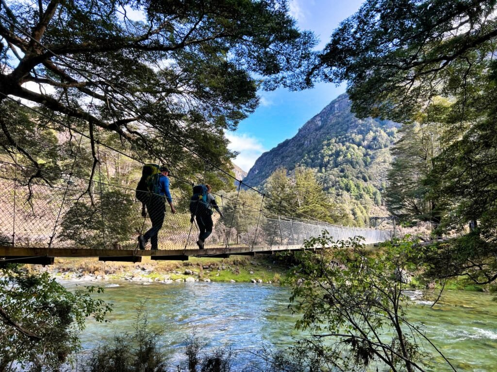 A swing bridge on the Greenstone-Caples Track — in the Caples Valley, New Zealand